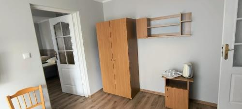 Kuchyň nebo kuchyňský kout v ubytování Słoneczny Brzeg