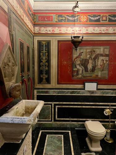 a bathroom with a sink and a toilet in it at Residenza Rinascimento 