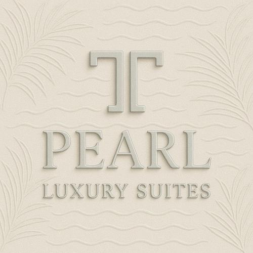 a sign for the t park luxury suites at Pearl Luxury Suites in Paralia Dionysiou