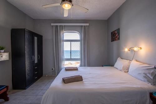 Ένα ή περισσότερα κρεβάτια σε δωμάτιο στο Seagull 513