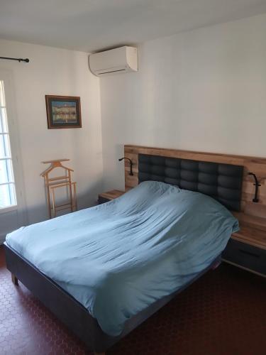 Ένα ή περισσότερα κρεβάτια σε δωμάτιο στο Appartement T2 à la Croix Valmer piscine et tennis