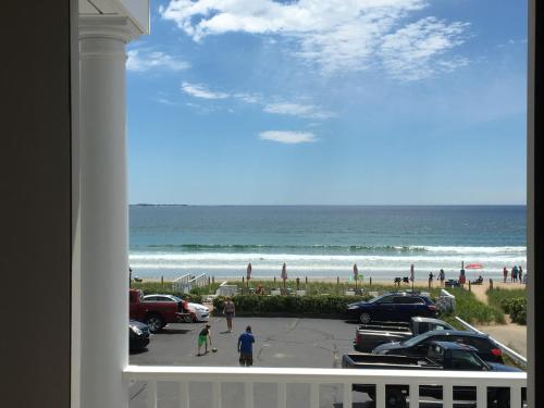 a view of the beach from a balcony at The Rebekah Inn in Old Orchard Beach