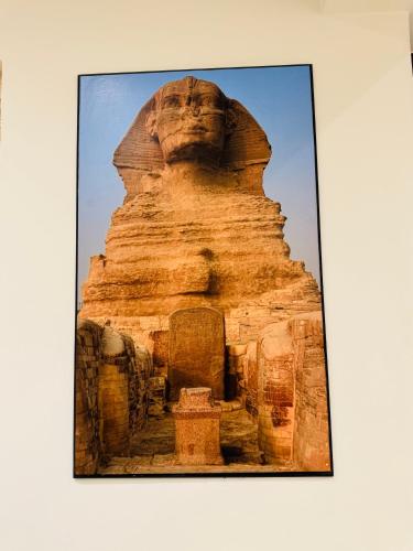 a picture of the statue of sphinx at thearaohramids at Flower Pyramids INN in Cairo