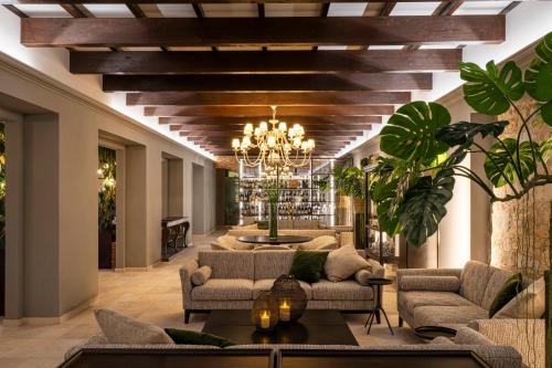 Гостиная зона в Spinerola Hotel Restaurant e Spa Arborea