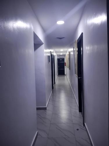 a hallway of a hospital with at Grand Churchill Luxury Hotel in Orimedu