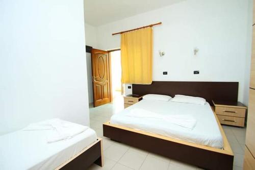 Una cama o camas en una habitación de Hotel Colosseo