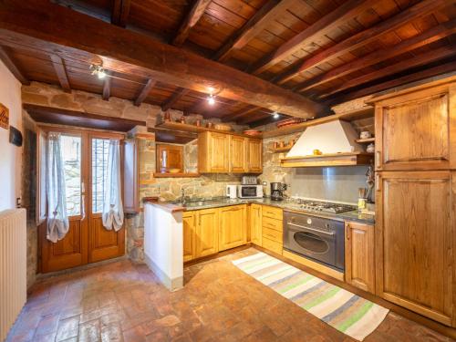 Kuchyň nebo kuchyňský kout v ubytování Holiday Home Podere Le Coste by Interhome