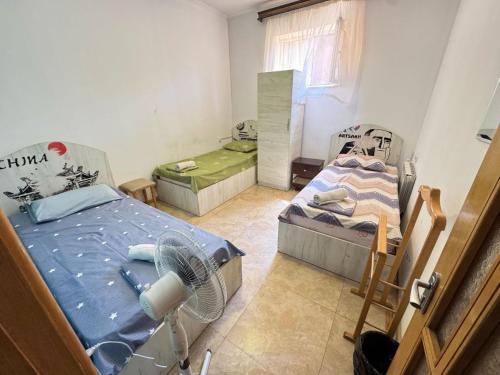 Giường trong phòng chung tại Kond Xostel