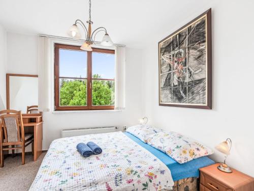 Postel nebo postele na pokoji v ubytování Apartment Apartmán 611 by Interhome