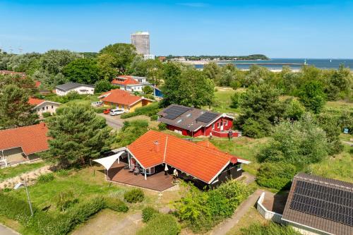 an overhead view of a house with an orange roof at Strandblick - Dorf 1 Ferienhaus 01 in Priwall