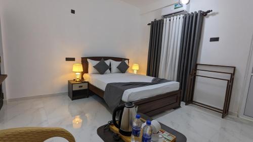 Кровать или кровати в номере White Pearl Villa