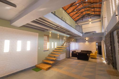 Φωτογραφία από το άλμπουμ του StayLeisurely The Flint House 3BHK, Murbad σε Mamnoli