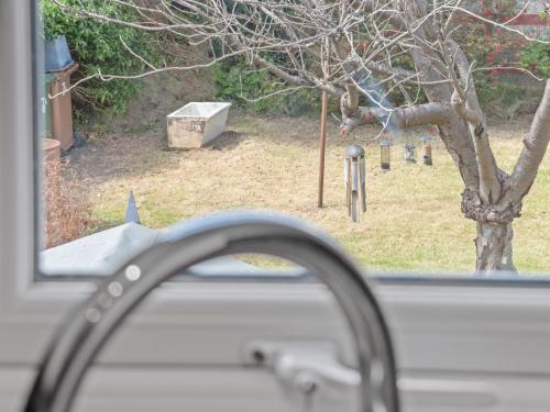 a close up of a car window with a bunch of parking meters at Ludgate 2 Bedroom Apartment - Alloa in Alloa