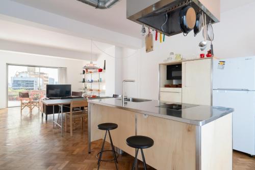 Stylish Flat w/ Terrace & Views by HostWise