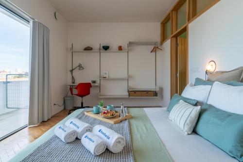 Stylish Flat w/ Terrace & Views by HostWise