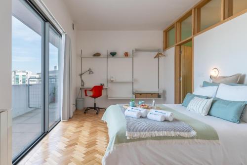 Stylish Flat w/ Terrace & Views by HostWise