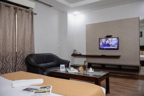 TV a/nebo společenská místnost v ubytování HHW Hotel- Agra