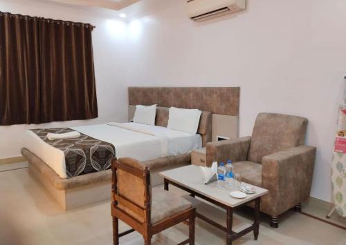 Katil atau katil-katil dalam bilik di Motel New Milan, Muzaffarpur