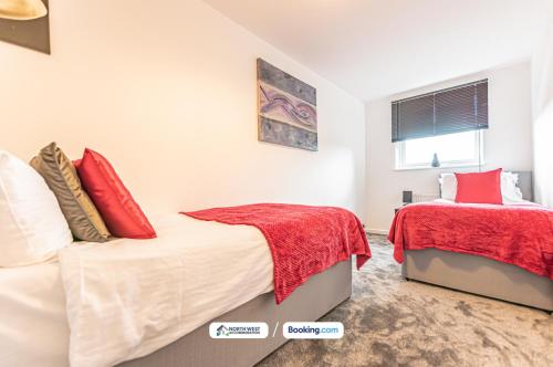 Ένα ή περισσότερα κρεβάτια σε δωμάτιο στο 4-Bed House in Lowton Ideal for Contractors & Families