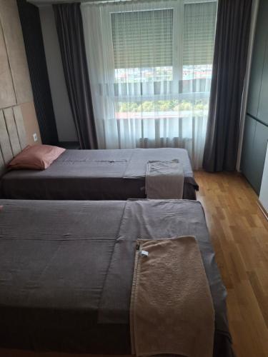 Postel nebo postele na pokoji v ubytování Remote Work - Skopje