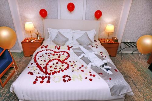 Ένα ή περισσότερα κρεβάτια σε δωμάτιο στο Skoop Hotel Jeddah