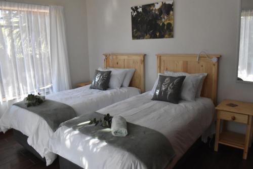 Ένα ή περισσότερα κρεβάτια σε δωμάτιο στο Feet Up at 25