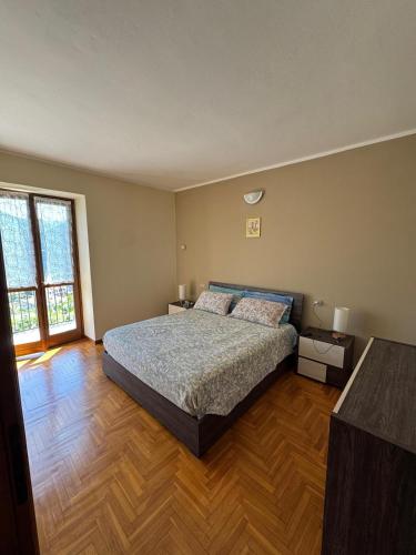 Ένα ή περισσότερα κρεβάτια σε δωμάτιο στο Gringo's Paradise apartment