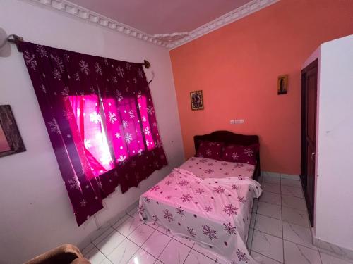 Ένα ή περισσότερα κρεβάτια σε δωμάτιο στο Hôtel charles