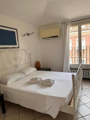 Ένα ή περισσότερα κρεβάτια σε δωμάτιο στο Residence Porta Saragozza
