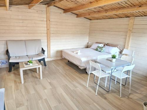 En eller flere senge i et værelse på Cabin-holiday