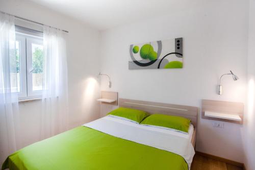 Ένα ή περισσότερα κρεβάτια σε δωμάτιο στο Holiday Home Freeda