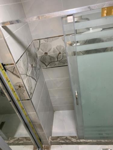 a staircase in a building with a glass door at Studio in Porto Said Compound in Port Said