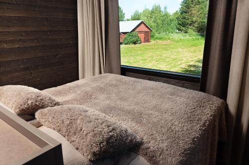 Katil atau katil-katil dalam bilik di Holiday Aparment Aava Suites