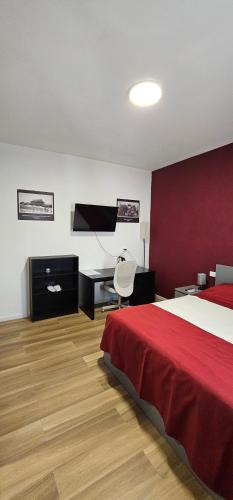 Postel nebo postele na pokoji v ubytování Orienty Home Pentacoro
