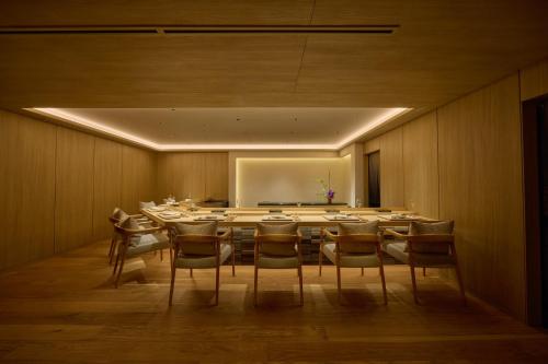 a large conference room with a long table and chairs at ANA InterContinental Beppu Resort & Spa by IHG in Beppu