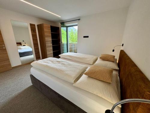 Кровать или кровати в номере nature house