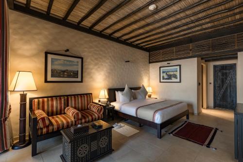 Ein Bett oder Betten in einem Zimmer der Unterkunft Atana Musandam Resort