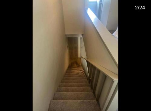 a stairway in a building with a stair case at Quality stay in Birmingham