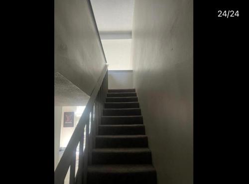 a staircase in a building with a stair case at Quality stay in Birmingham