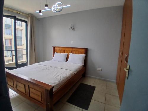 Postel nebo postele na pokoji v ubytování Residence next door 2br Coral