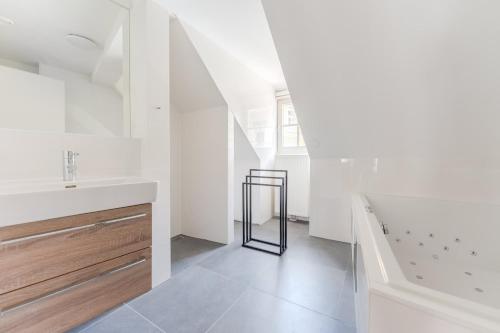 Koupelna v ubytování Hakuna - Penthouse Franziskanerplatz - Rooftop