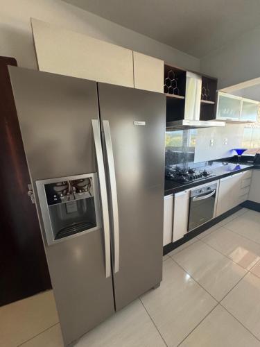 Η κουζίνα ή μικρή κουζίνα στο Personal Home - Estilo e conforto com garagem