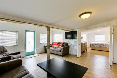 a living room with a couch and a table at Walk to Pier and River Dtwn Steinhatchee Escape! in Steinhatchee