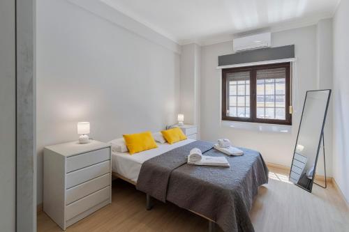 En eller flere senge i et værelse på Lisboa no Sado - By Y Concept