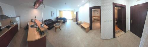 a large room with a bathroom and a living room at Apartment Miramar Palace in Sunny Beach