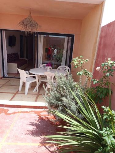 Ein Patio oder anderer Außenbereich in der Unterkunft Appartement Le Sable Uniquement les familles