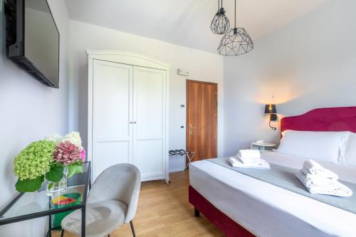 Кровать или кровати в номере Country Hotel Al Gallo