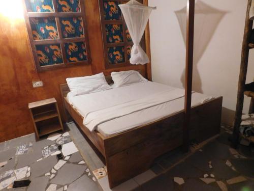 Postel nebo postele na pokoji v ubytování Paje lounge