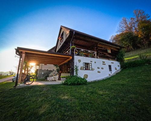 a house built out of a largeolithicolithicolithic house at Apartments Pajek & Pajčevina on the Hayrack in Dobje pri Lesičnem