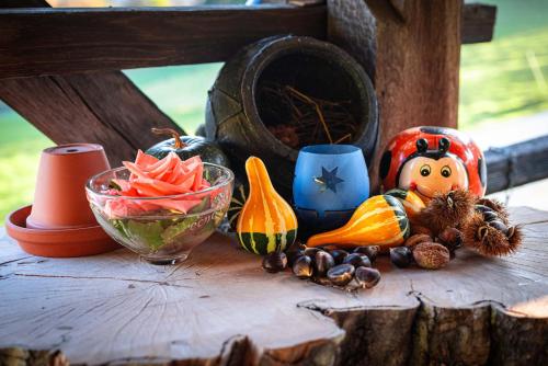 a table with halloween items on top of it at Apartments Pajek & Pajčevina on the Hayrack in Dobje pri Lesičnem